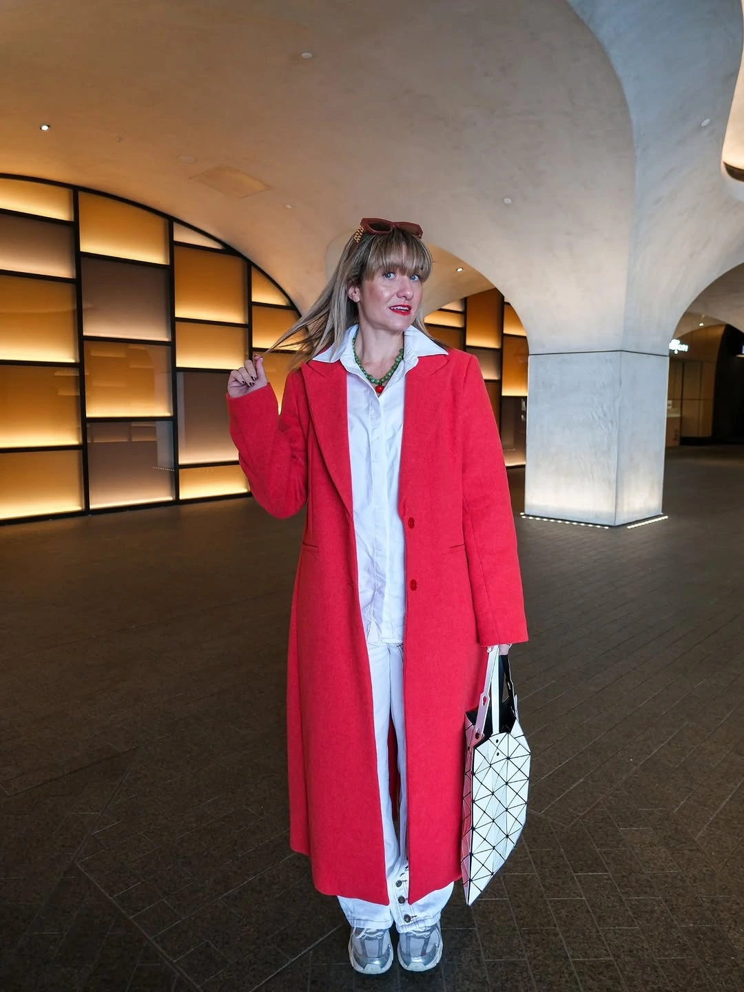 cozy & chic autumn outfits for women 2026 A Bold Red Coat That Brightens Gray Autumn Days