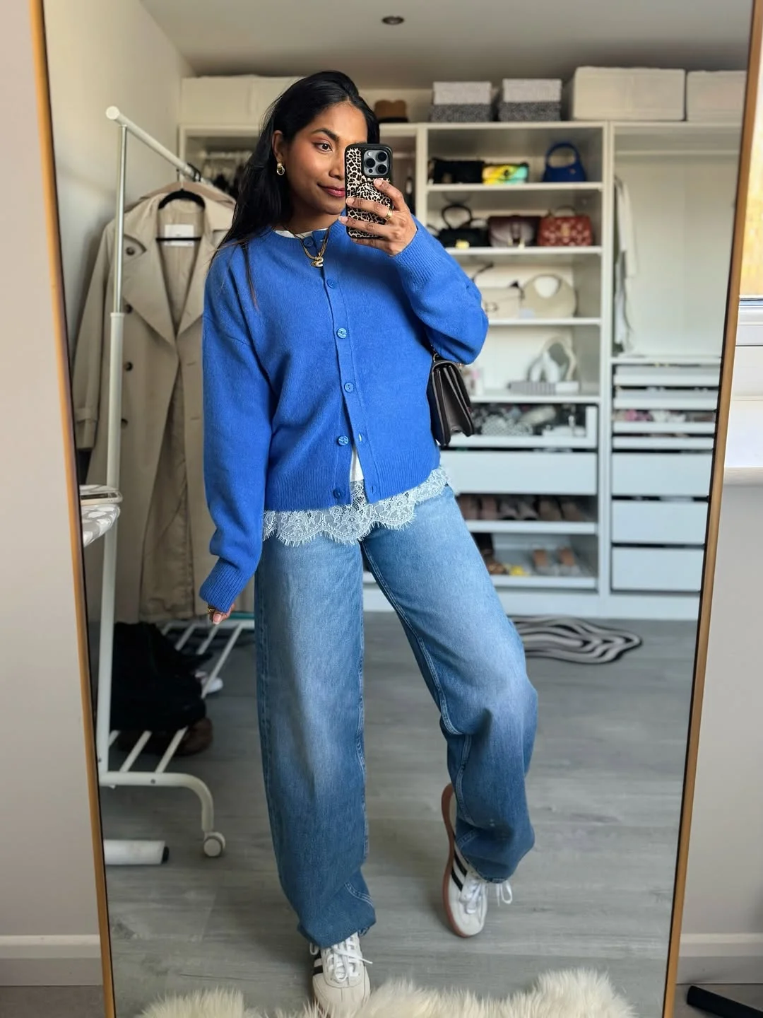 cozy chic fall outfits for 2026 A Pop of Blue That Brightens Gray Fall Days