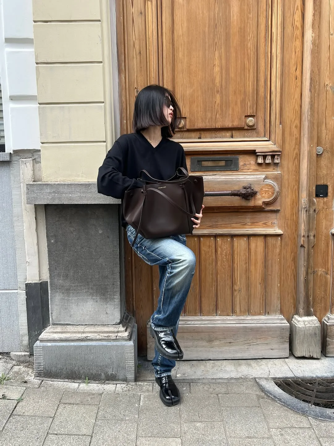 fall denim outfits for women 2026 Minimal Black Knit Styling With Relaxed Everyday Denim