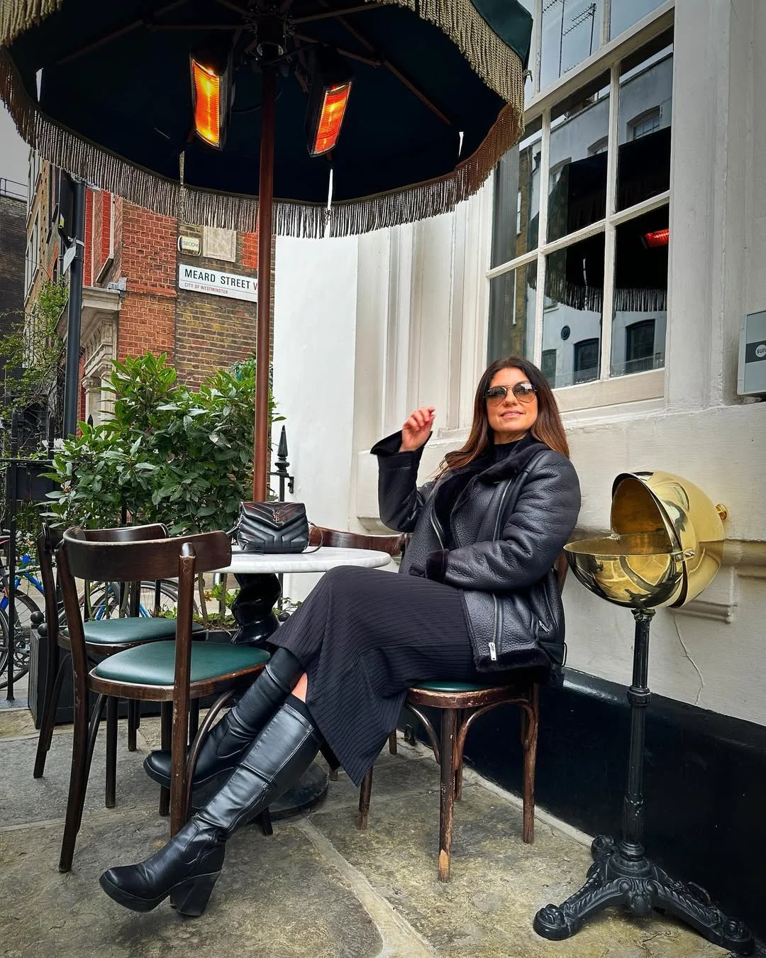 fall fashion for women over 40 All-Black Elegance with Statement Boots