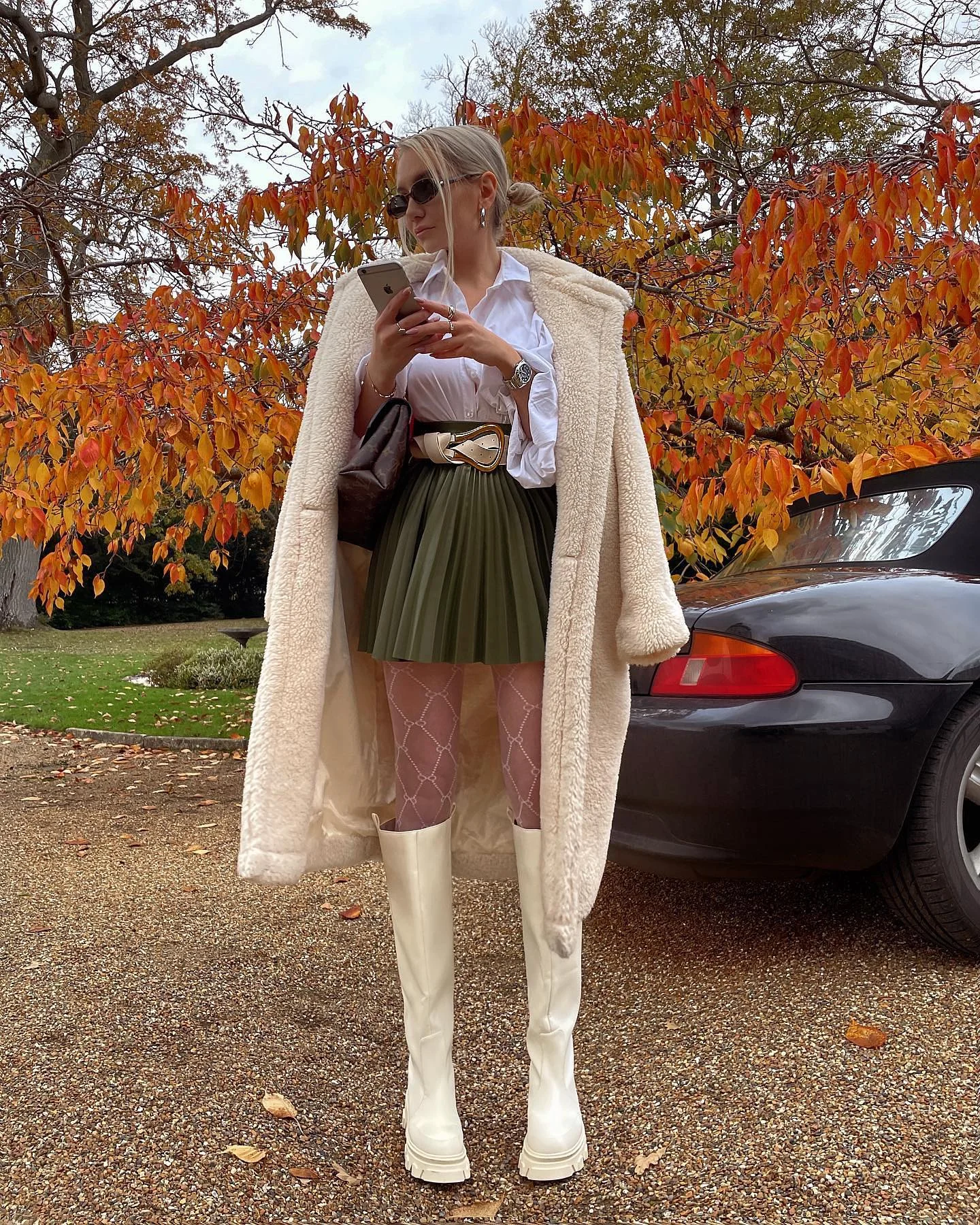 fall going out outfits 2026 Elevated Neutrals With a Pleated Skirt for a Chic Fall Night