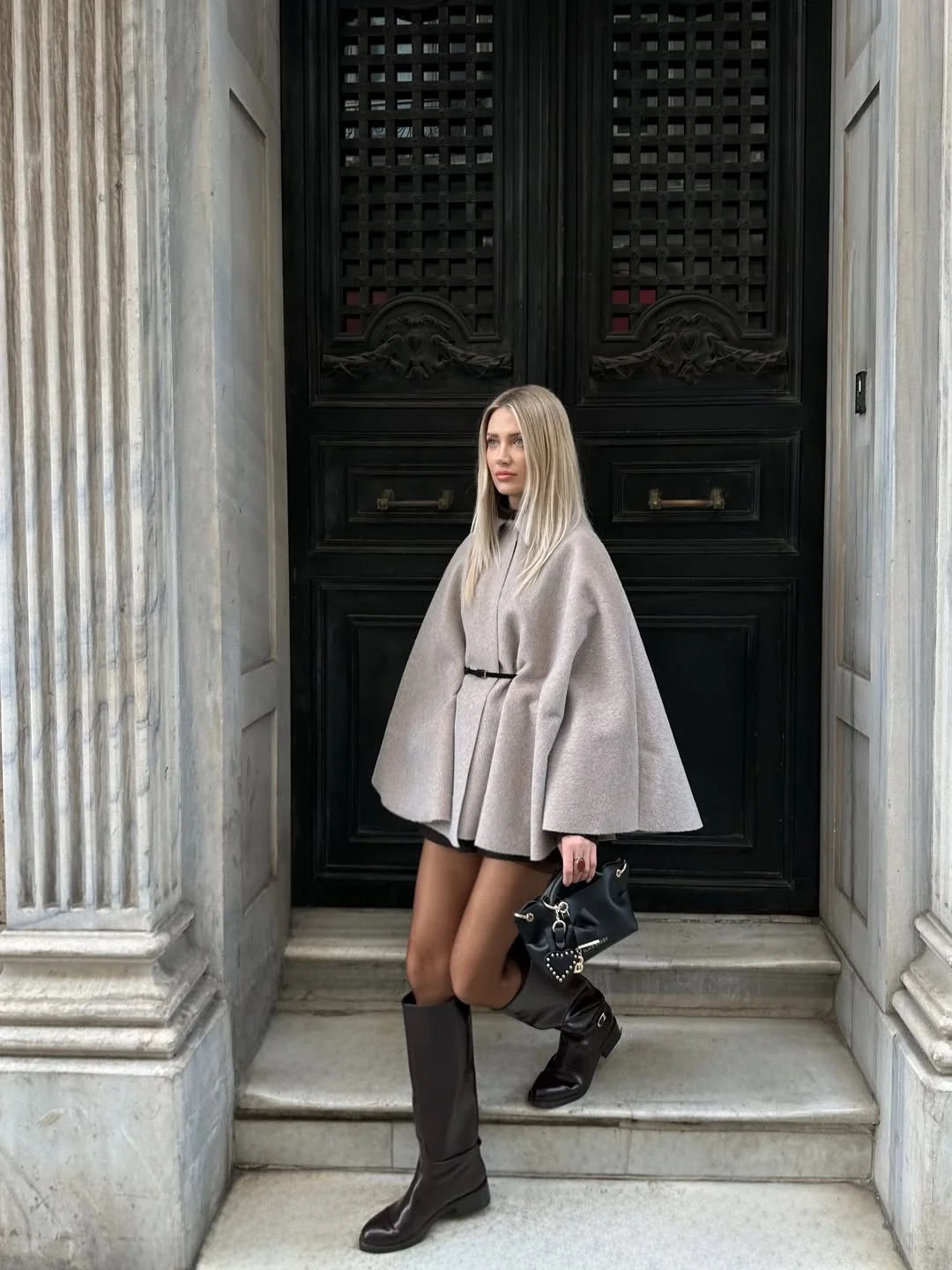 fall outfits with boots 2026 Statement Cape Coats and Knee-High Boots for Elegant Fall Days