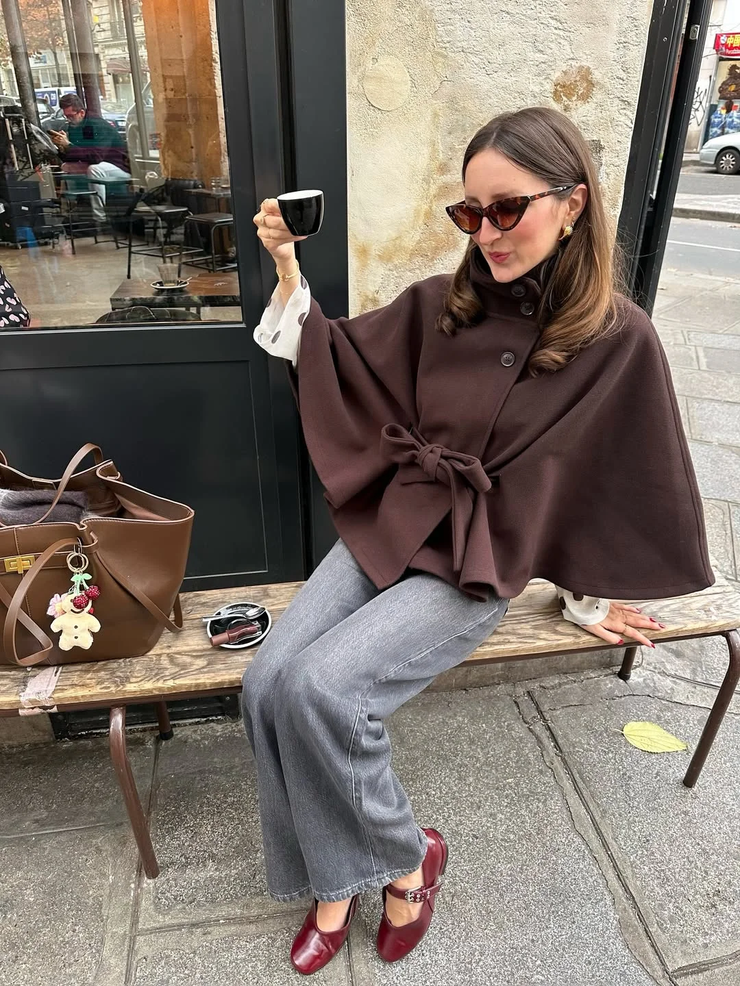 fall outfits with coat 2026 A Cape Style Coat That Feels Unexpectedly Chic