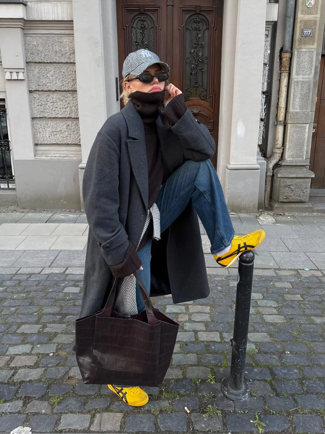 fall outfits with coat 2026 Dark Layers and Bright Sneakers for Street Style Energy