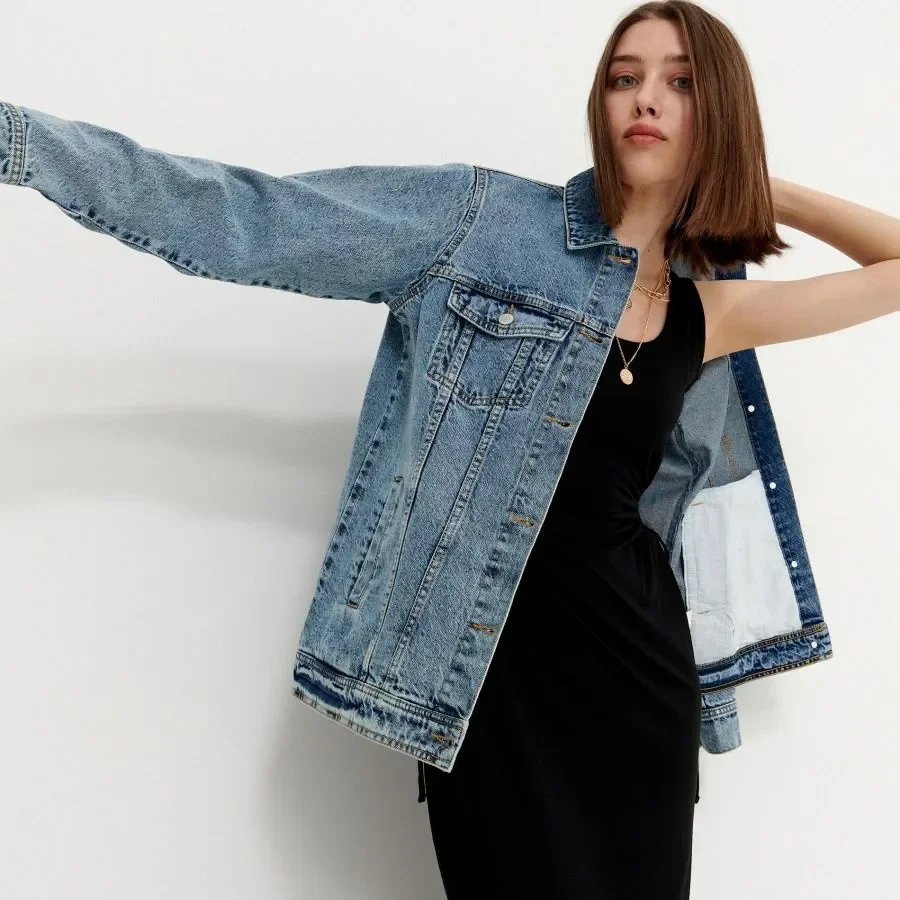 fall outfits with jeans jacket 2026 The Relaxed Denim Jacket Over a Minimal Black Dress