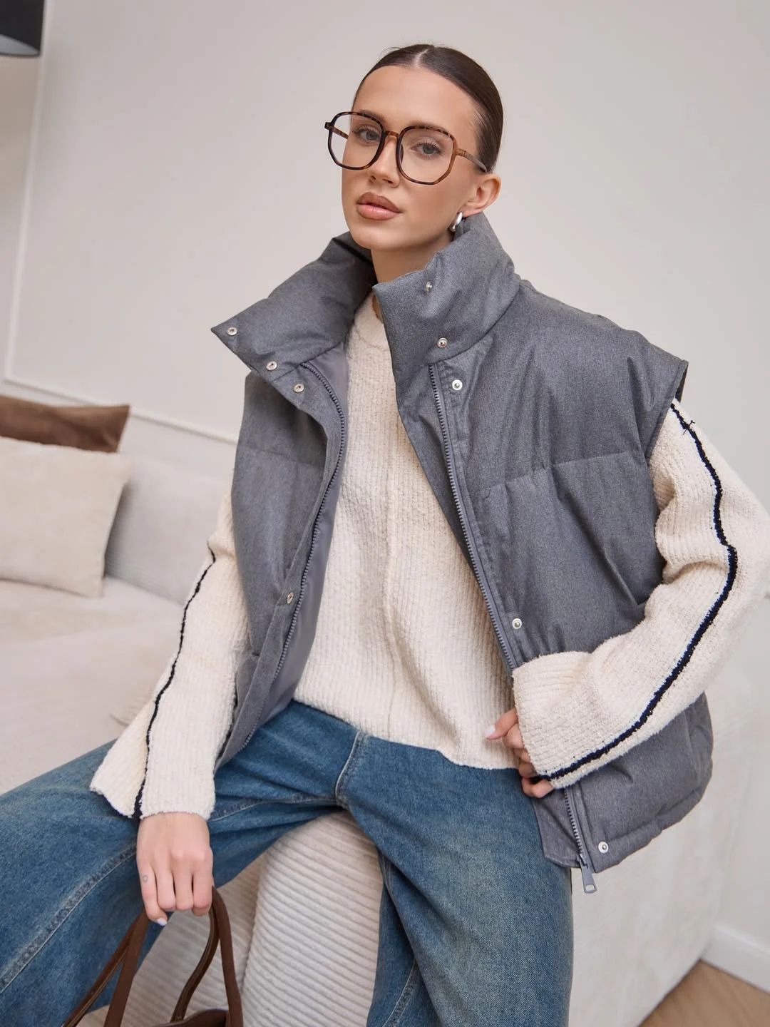 fall outfits with vests 2026 Grey Puffer Vests Meet Cozy Knitwear
