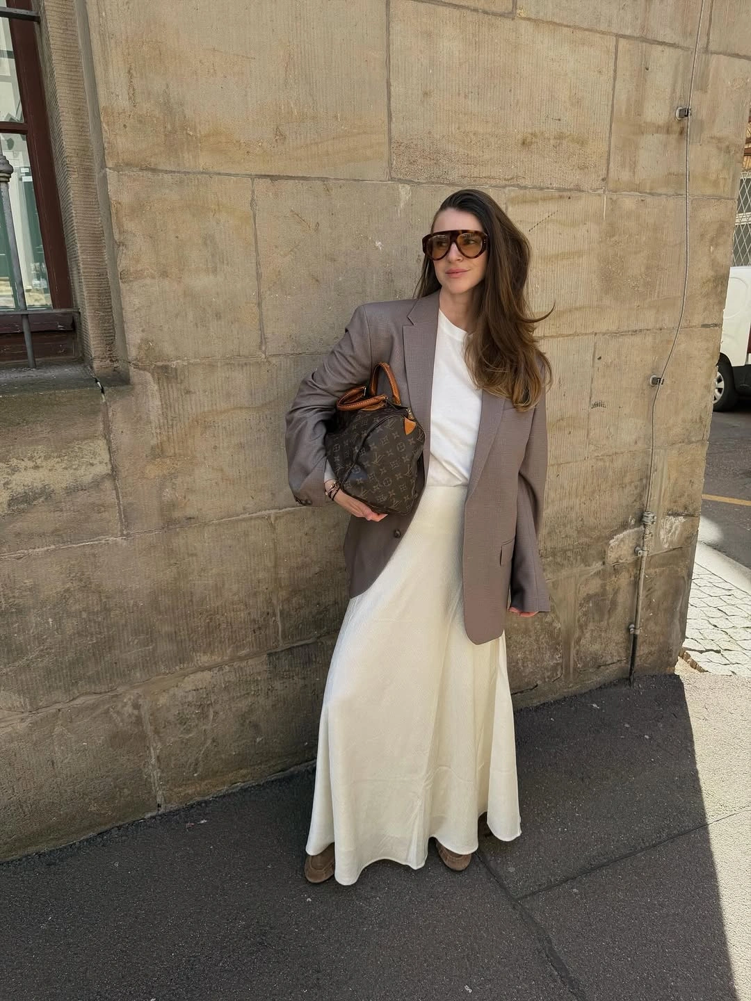 fall travel outfits 2026 Elegant Blazer and Satin Skirt for Sophisticated City Escapes