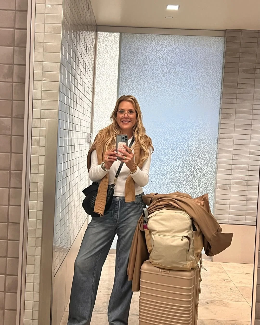 fall travel wardrobe for women 2026 Neutral Layers That Make Every Airport Outfit Feel Effortless