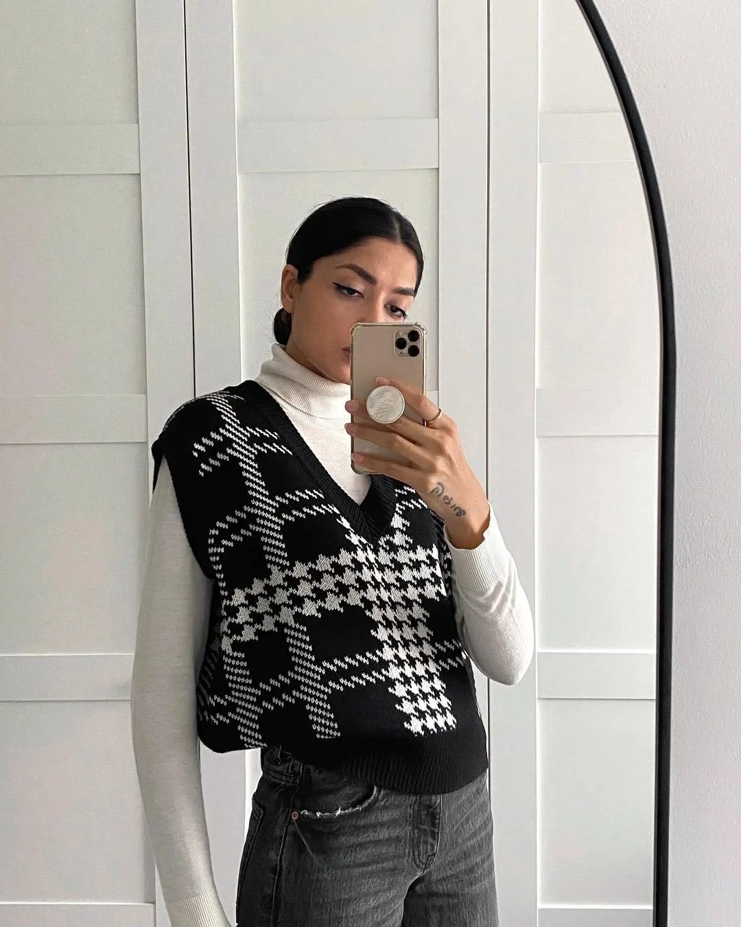 fall vest outfits for women 2026 Graphic Black and White Knits with Downtown Energy