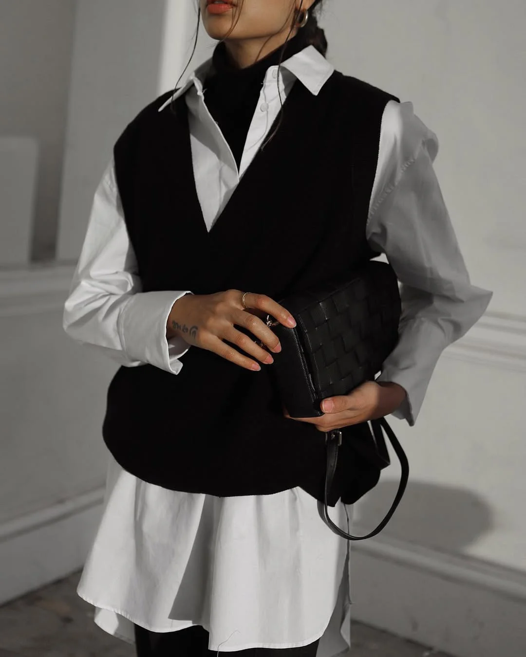 fall vest outfits for women 2026 Black and White Layering for Effortless Office Style