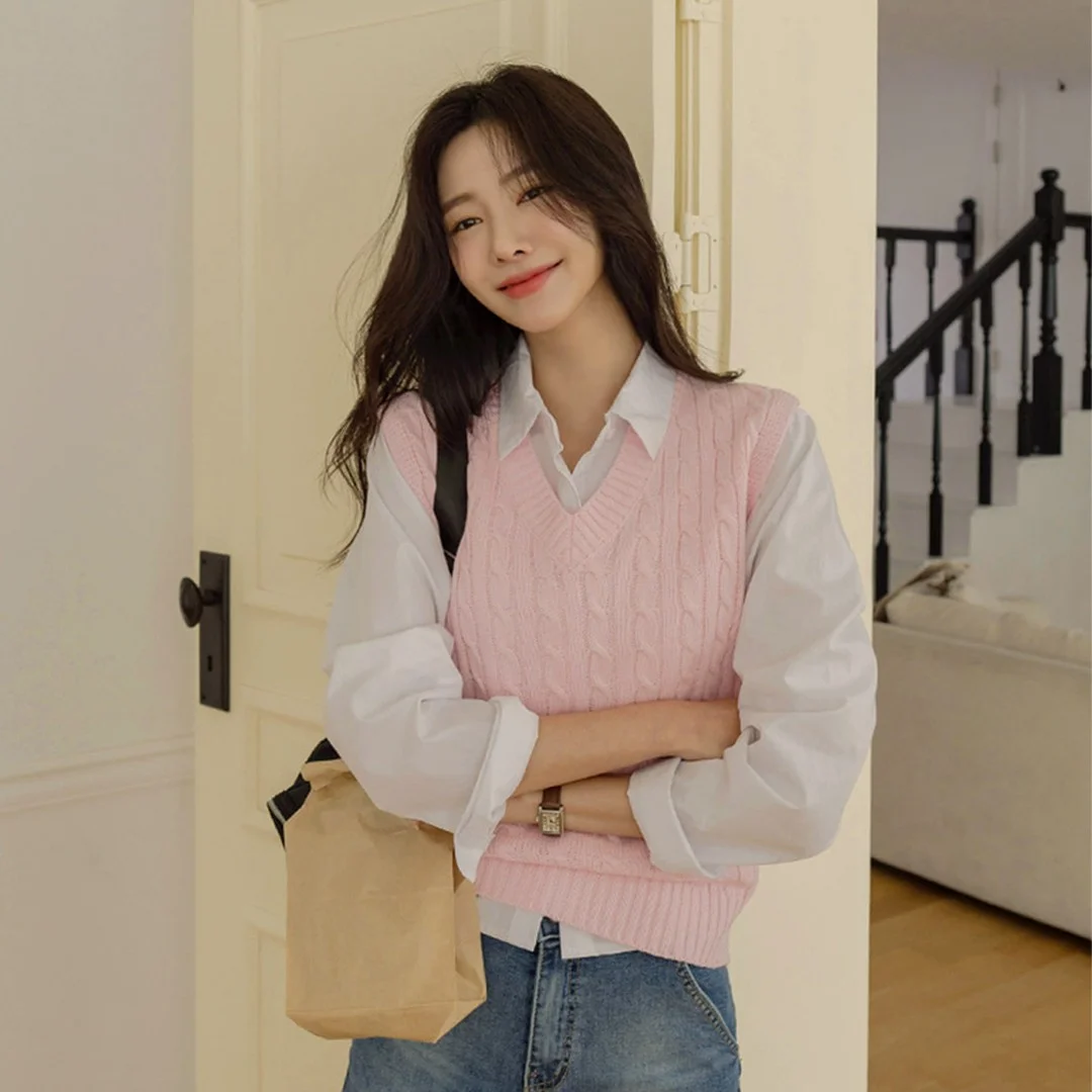 fall vest outfits for women 2026 Soft Pink Knits and Classic Blue Jeans