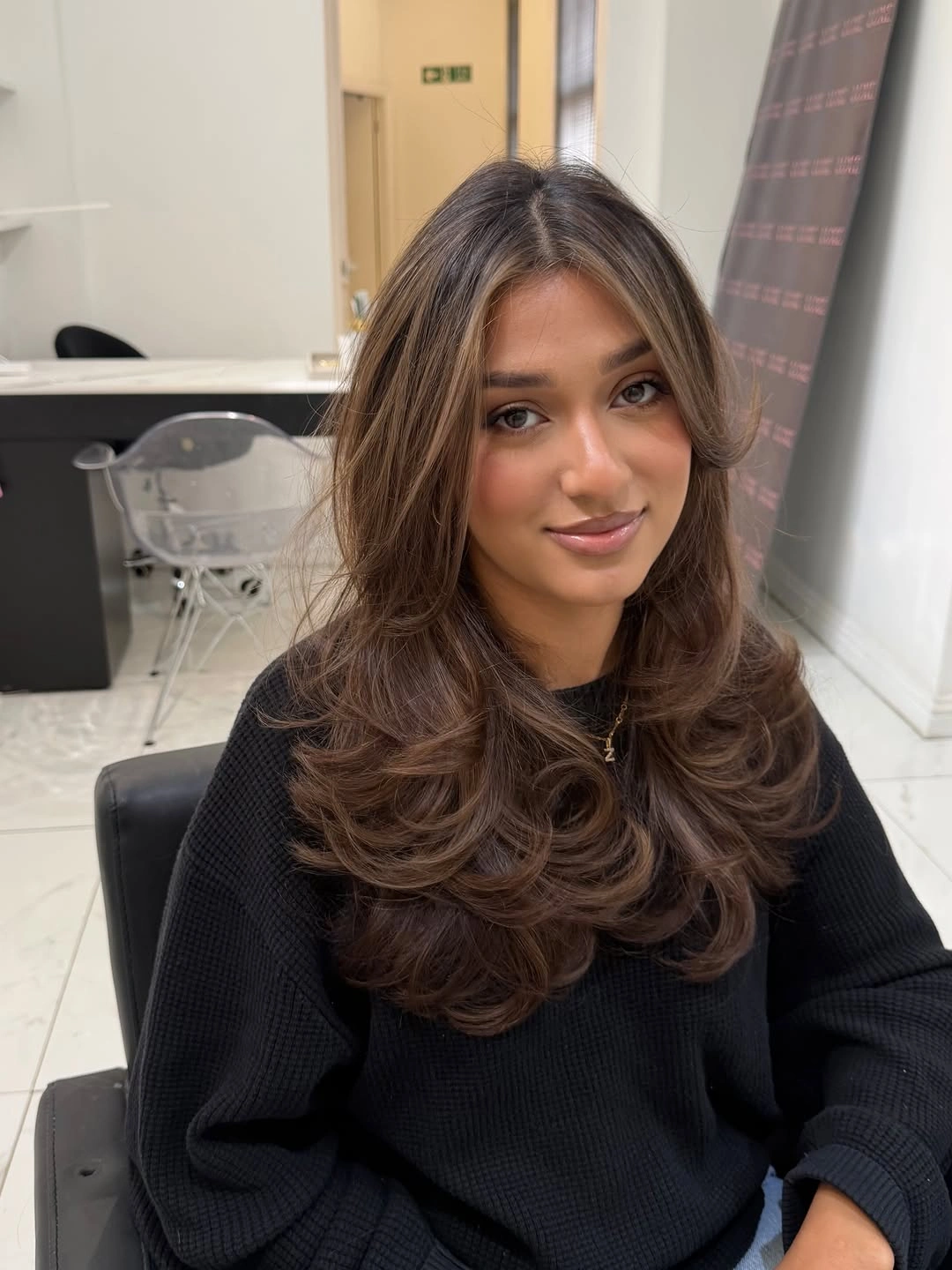 august hairstyles and color ideas 2026 Glossy Chocolate Blowout with Soft Curtain Layers