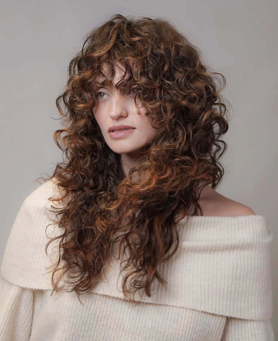 august hairstyles and color ideas 2026 Voluminous Copper Curls Full of Personality