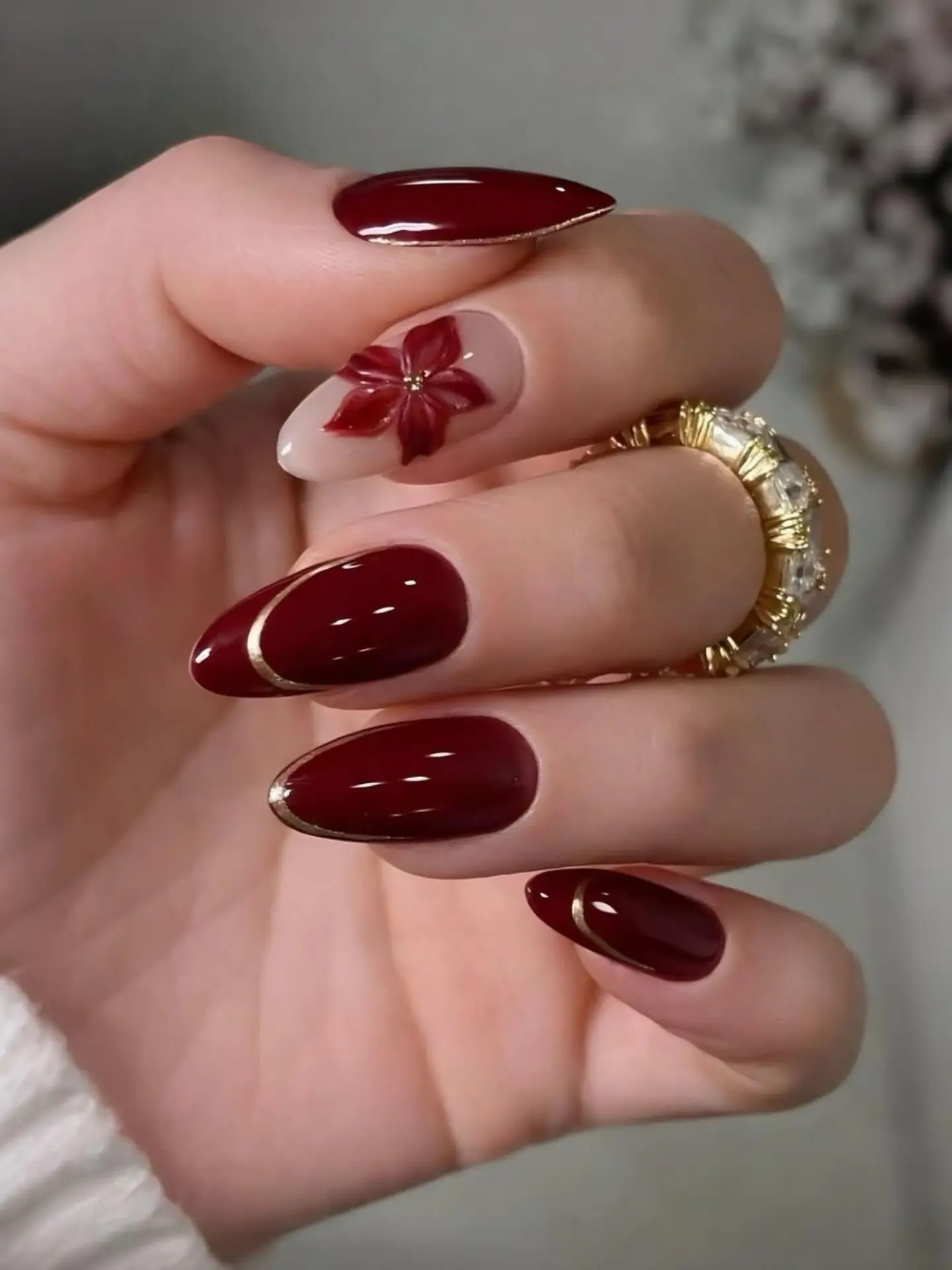 august nails color 2026 Classic Cherry Red with Delicate Floral Detail