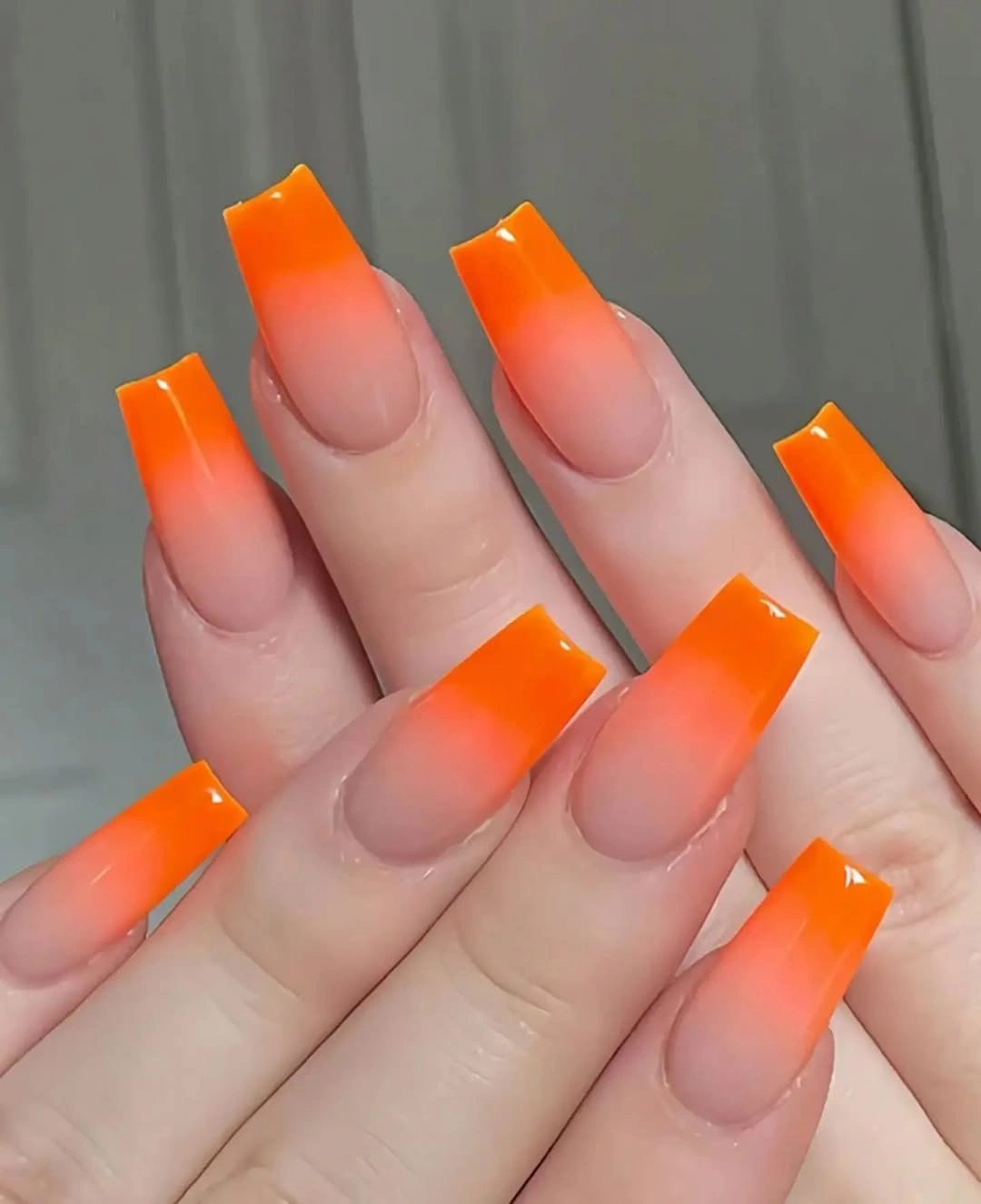 august nails color 2026 Vibrant Sunset Orange Ombre for Endless Summer Energy