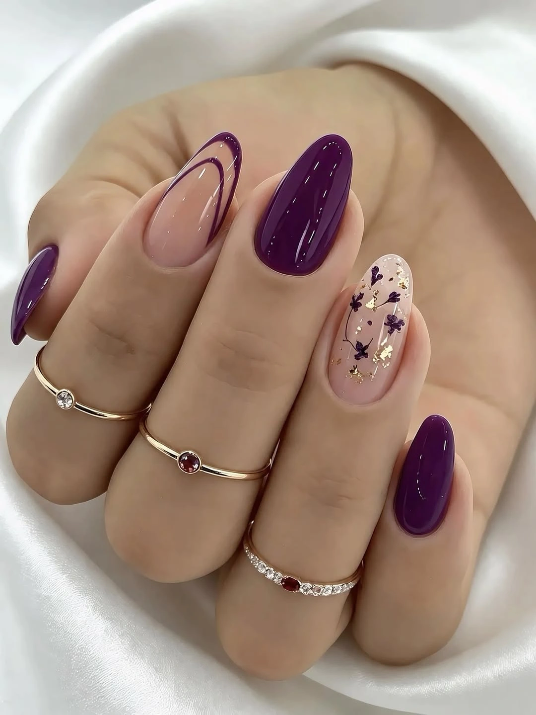 august nails color 2026 Elegant Plum Nails with Delicate Botanical Details