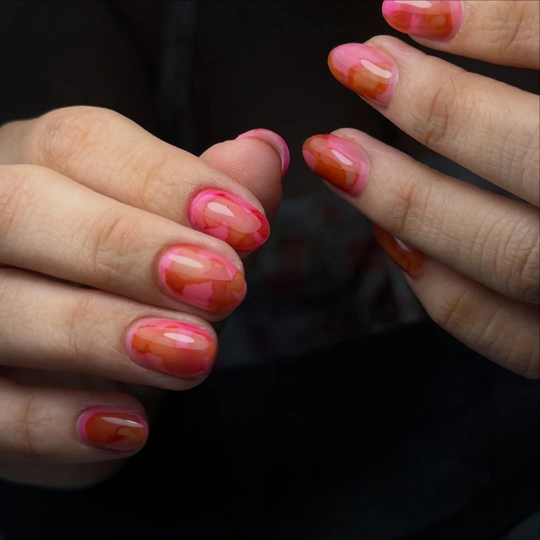 august nails color 2026 Pink Sunset Marble Nails with Glossy Depth
