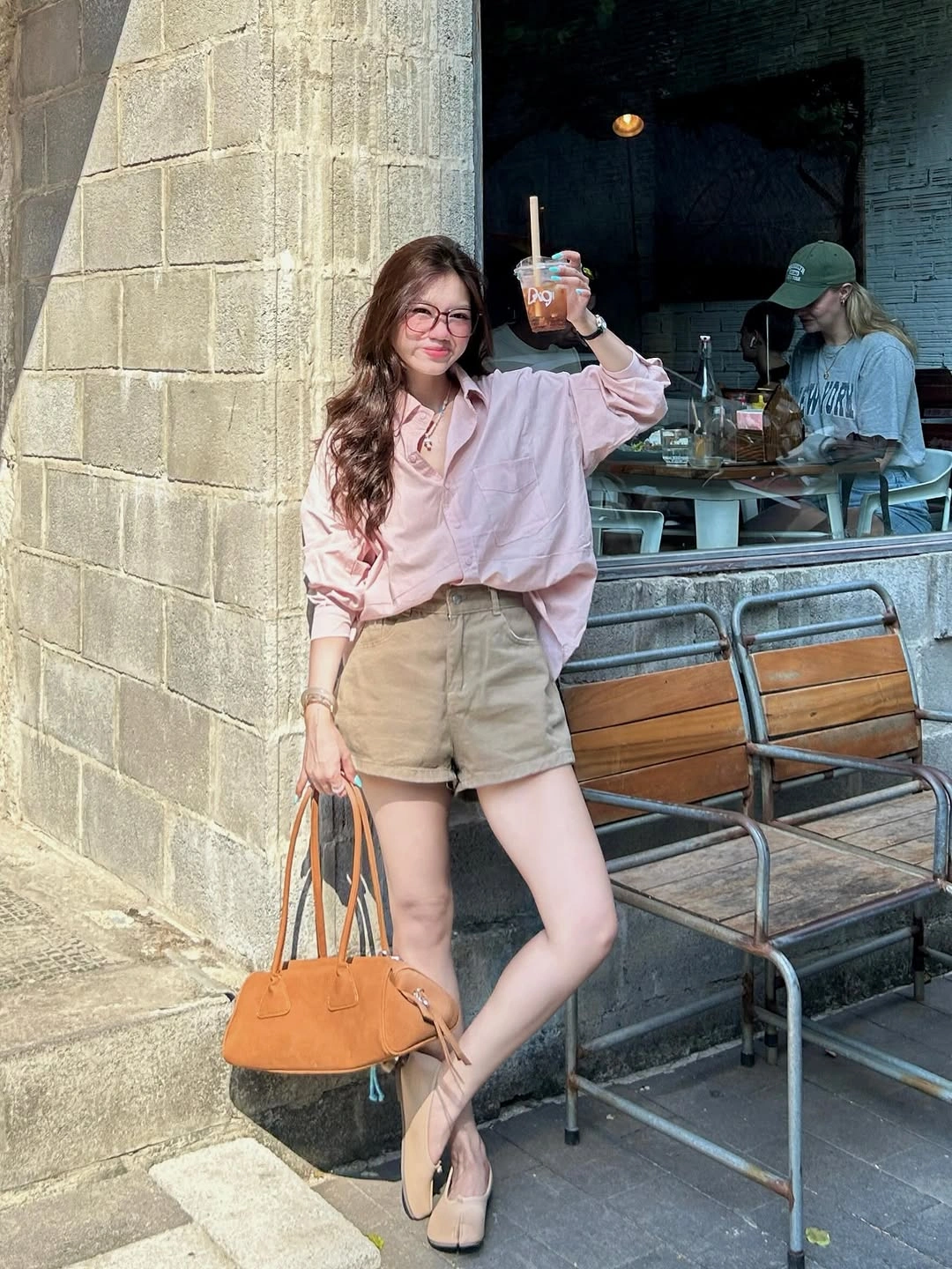 august outfits 2026 Soft Pink Shirts and Neutral Shorts Create Everyday Cafe Style