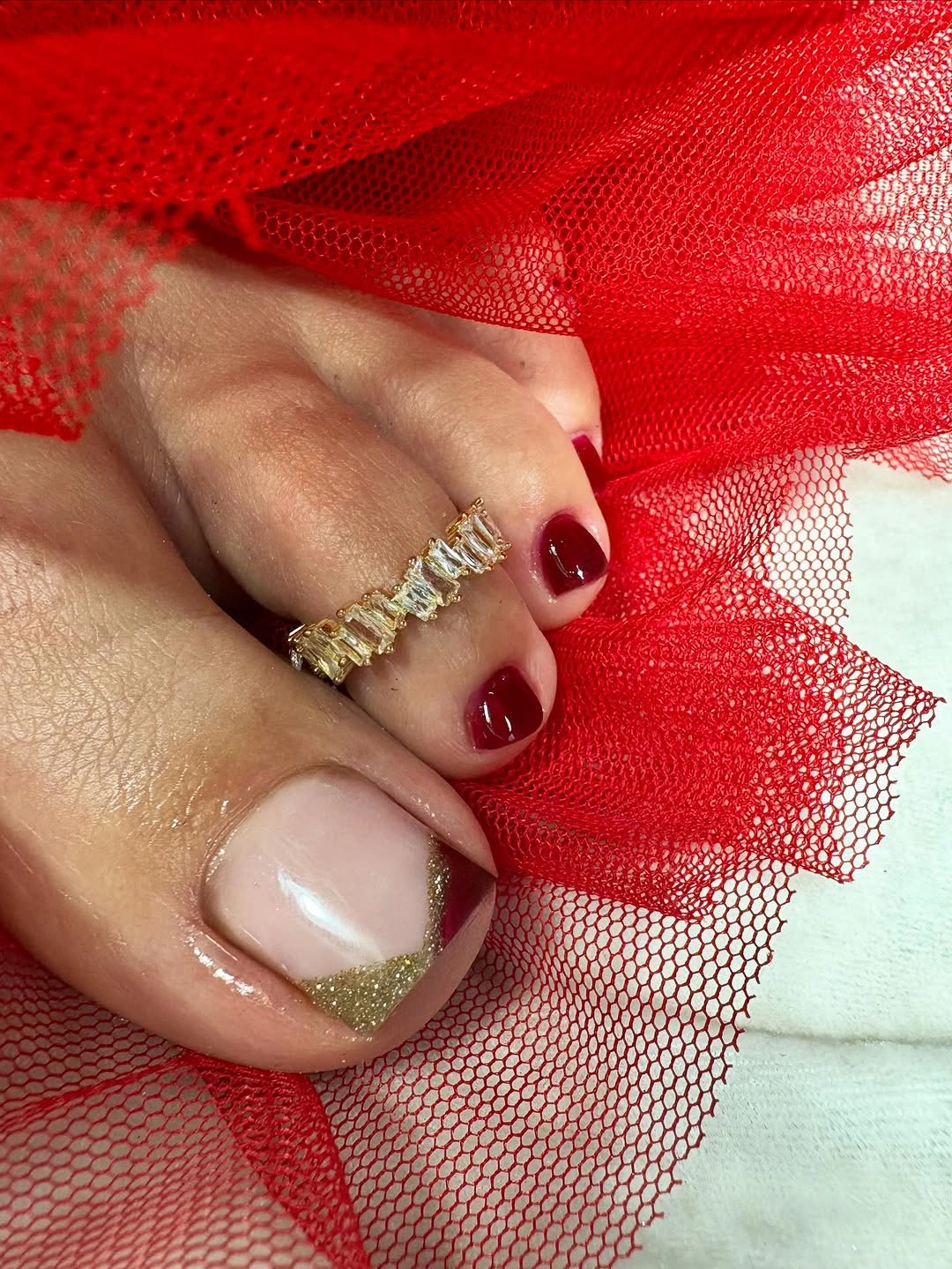 august toe nails 2026 Elegant Burgundy and Gold French Pedicure