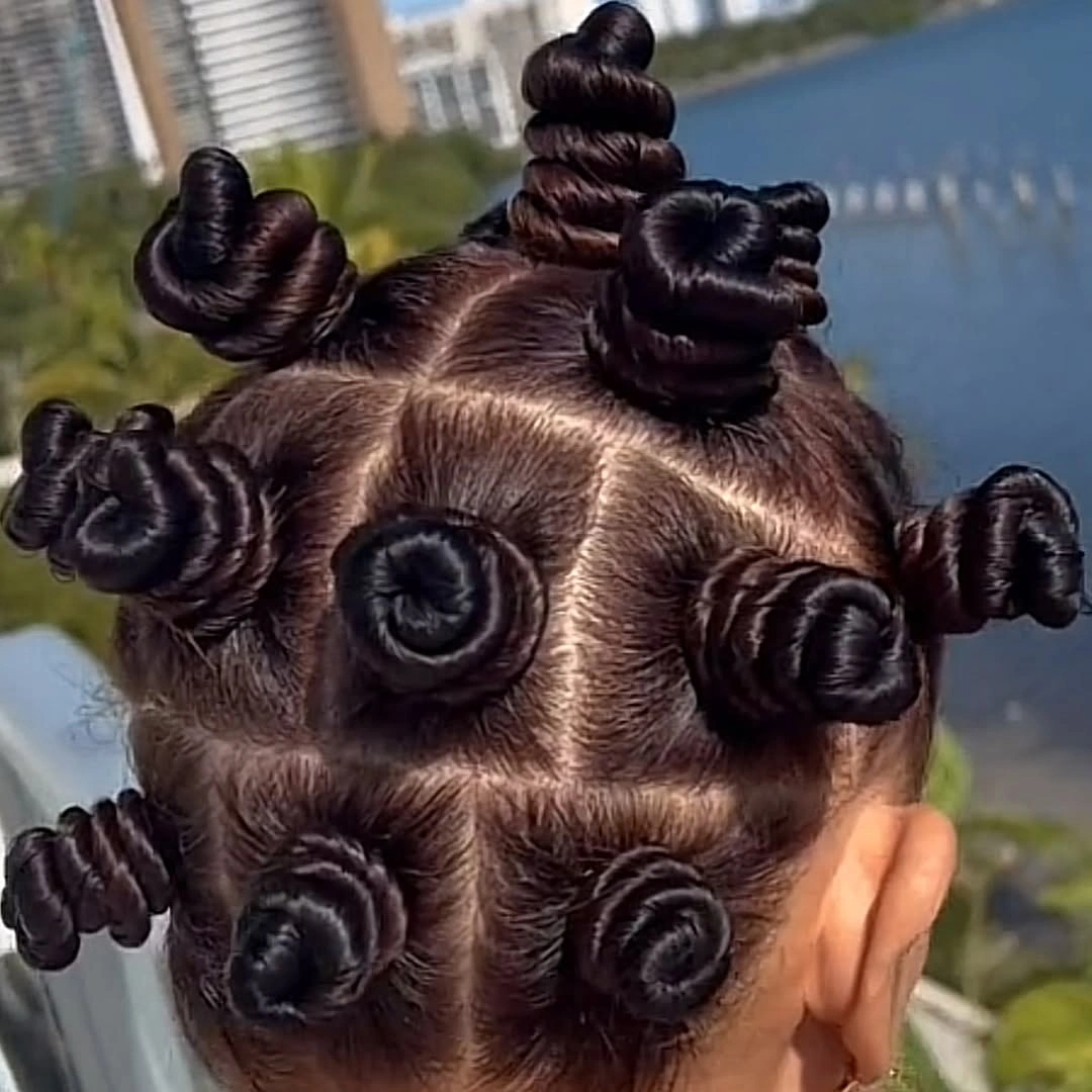 bantu knots hairstyles Glossy Sculptural Bantu Knots with Perfect Symmetry