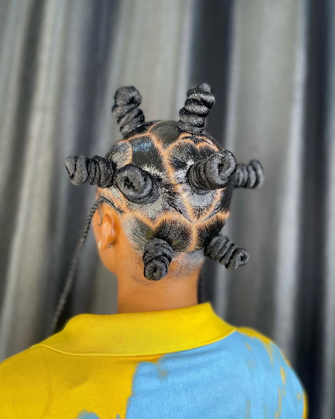 bantu knots hairstyles Minimalist Spiral Bantu Knots with Sleek Parting