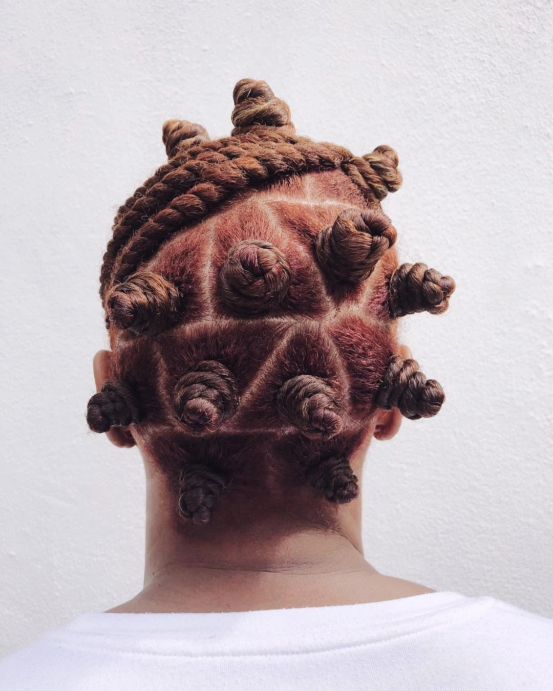 bantu knots hairstyles Warm Auburn Bantu Knots with Braided Crown Detail