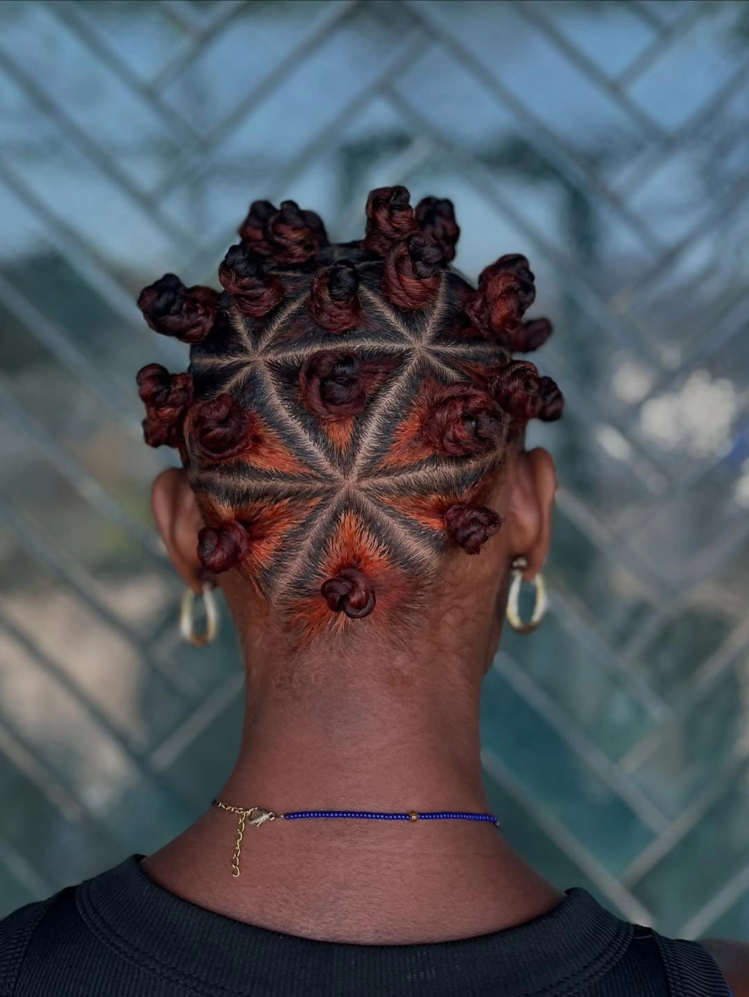 bantu knots hairstyles Geometric Copper Bantu Knots with Artistic Parting