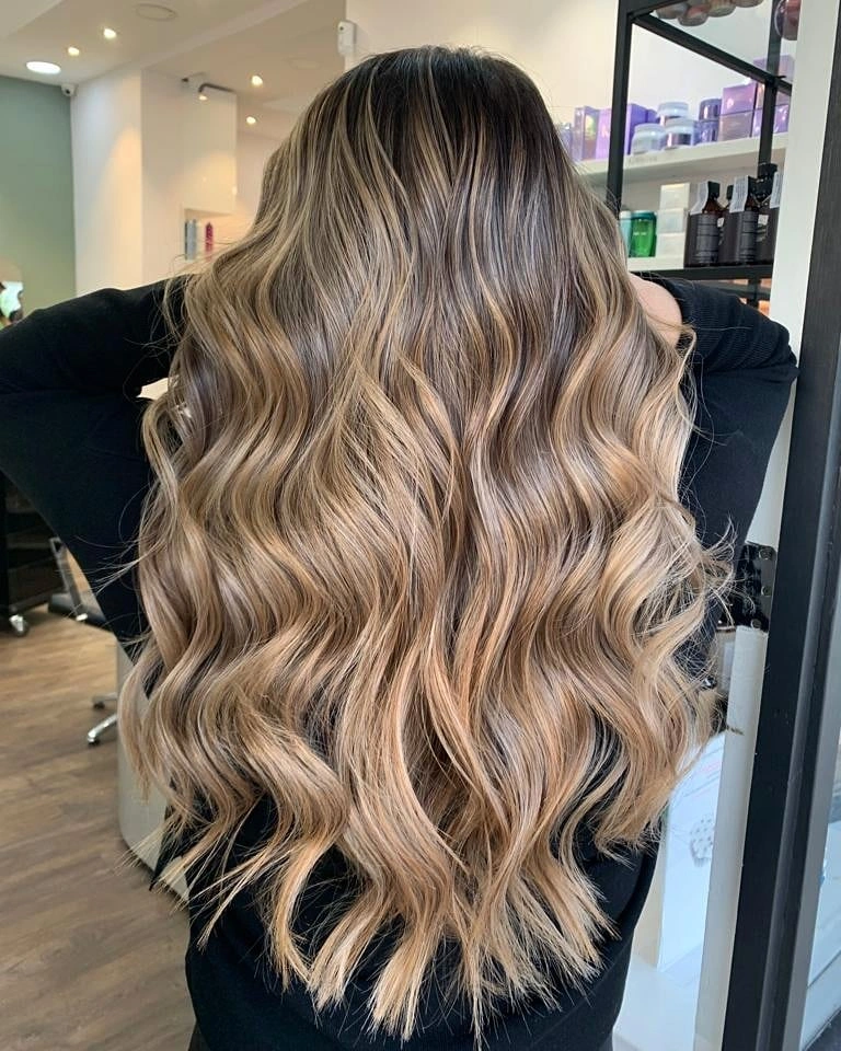 beige blond hair color Golden Beige Balayage with Lived-In Warmth