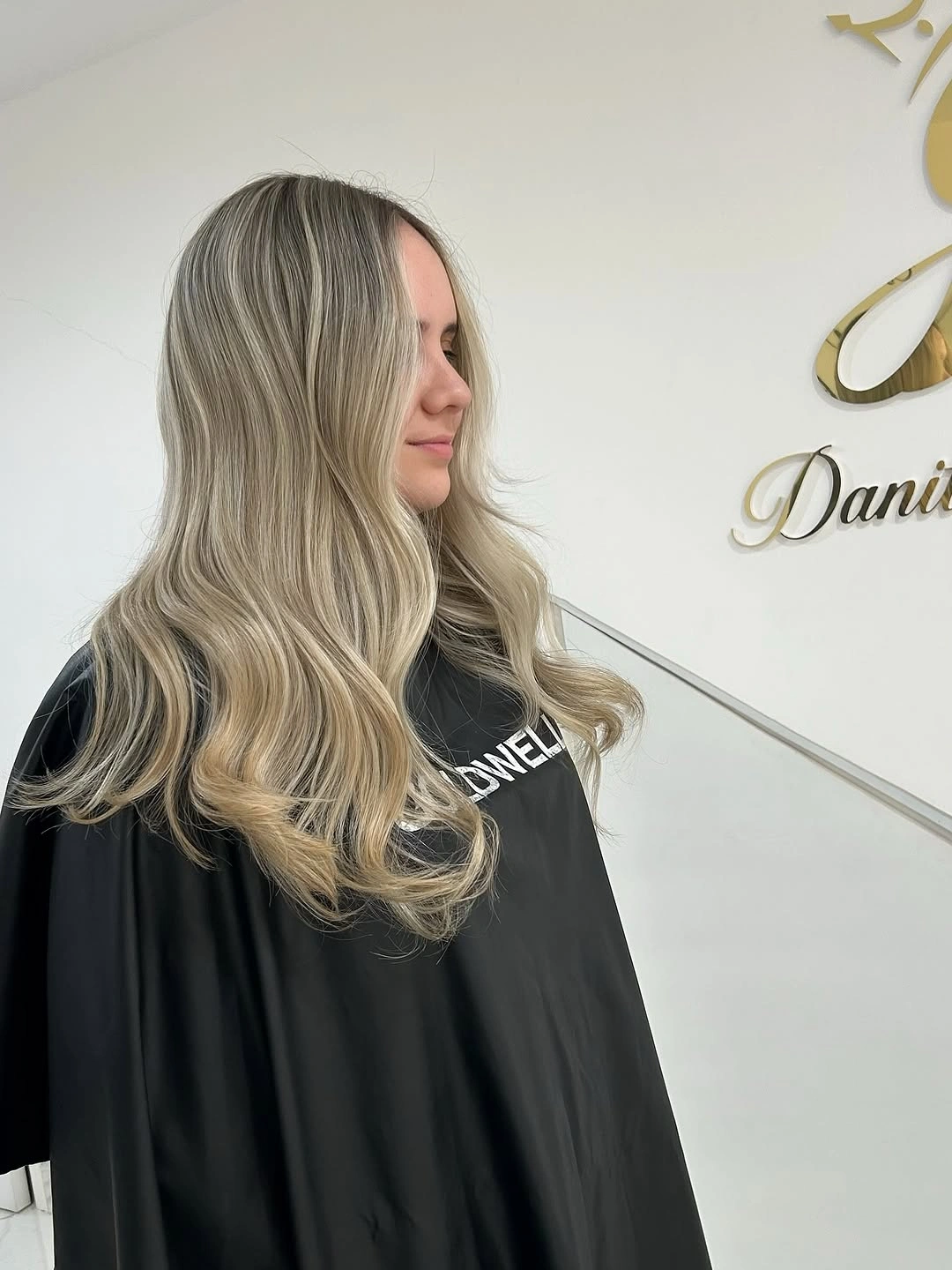 beige blond hair color Cool Pearl Beige Blonde with Sleek Soft Waves