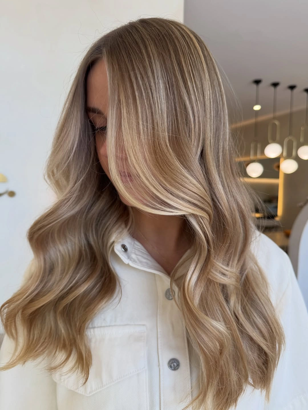 beige blond hair color Creamy Beige Blonde with Airy Face-Framing Layers