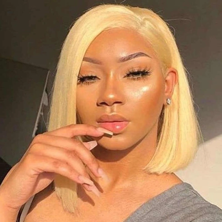 bob hairstyles for black women Short Bob With Full Bangs and a Chic Retro Feeling