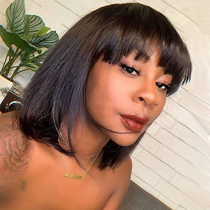 bob hairstyles for black women Sleek Black Bob With a Bright Statement Outfit