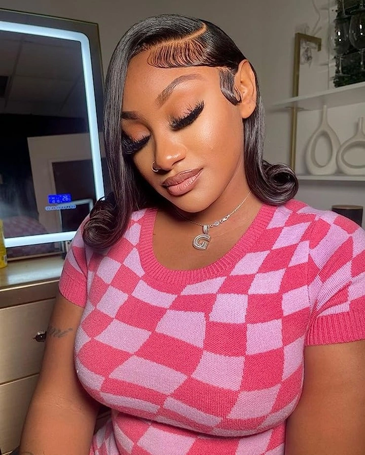 bob hairstyles for black women Glossy Side Part Bob With Sculpted Edges