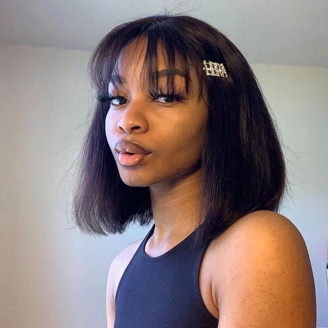 bob hairstyles for black women Soft Black Bob With Wispy Bangs and Hair Accessory