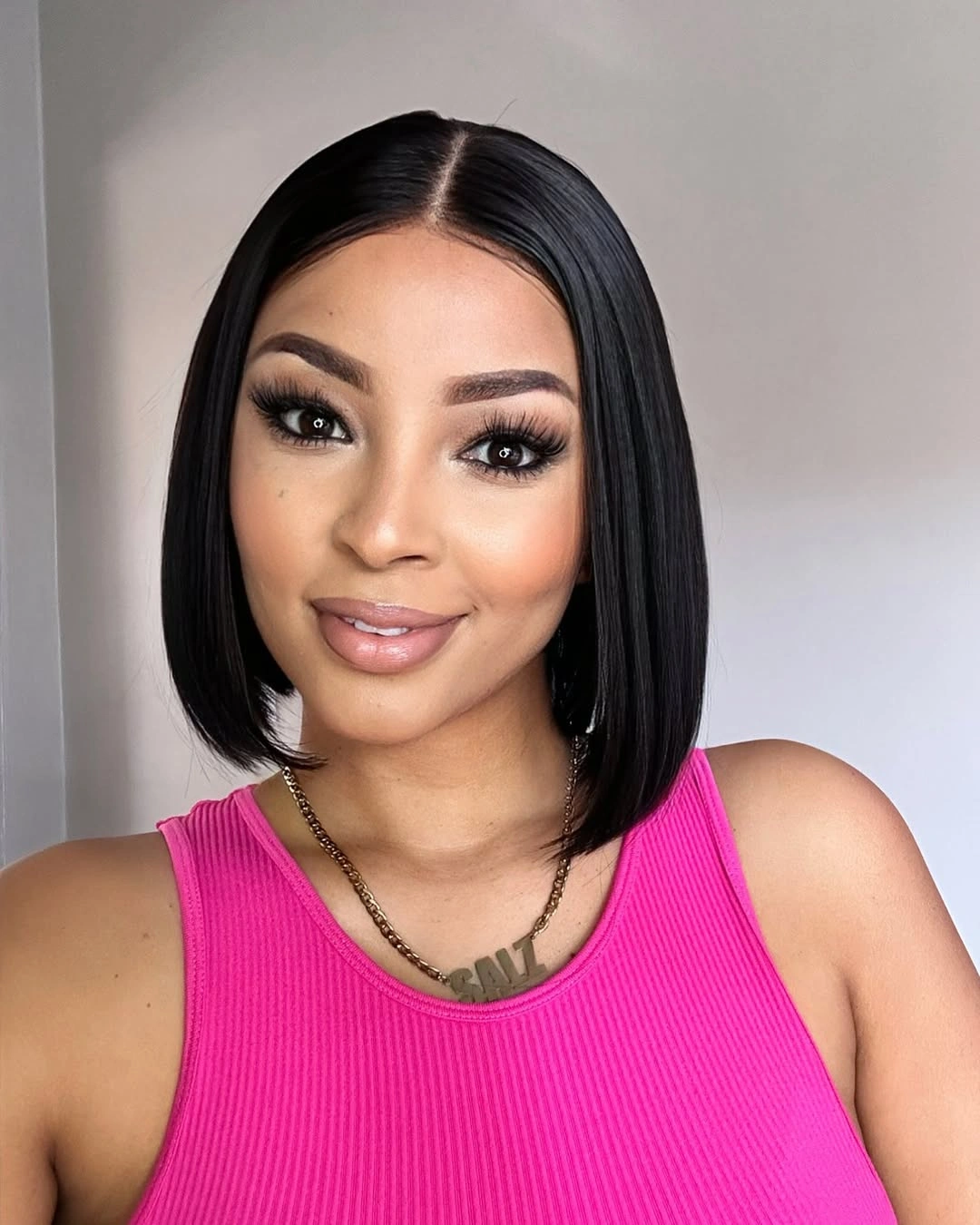 bob hairstyles for black women Classic Middle Part Black Bob With Clean Lines