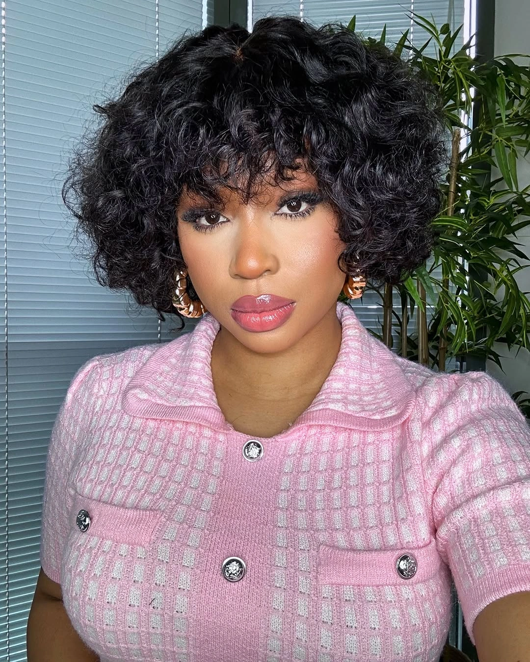 bob hairstyles for black women Voluminous Curly Bob With Natural Texture and Bangs