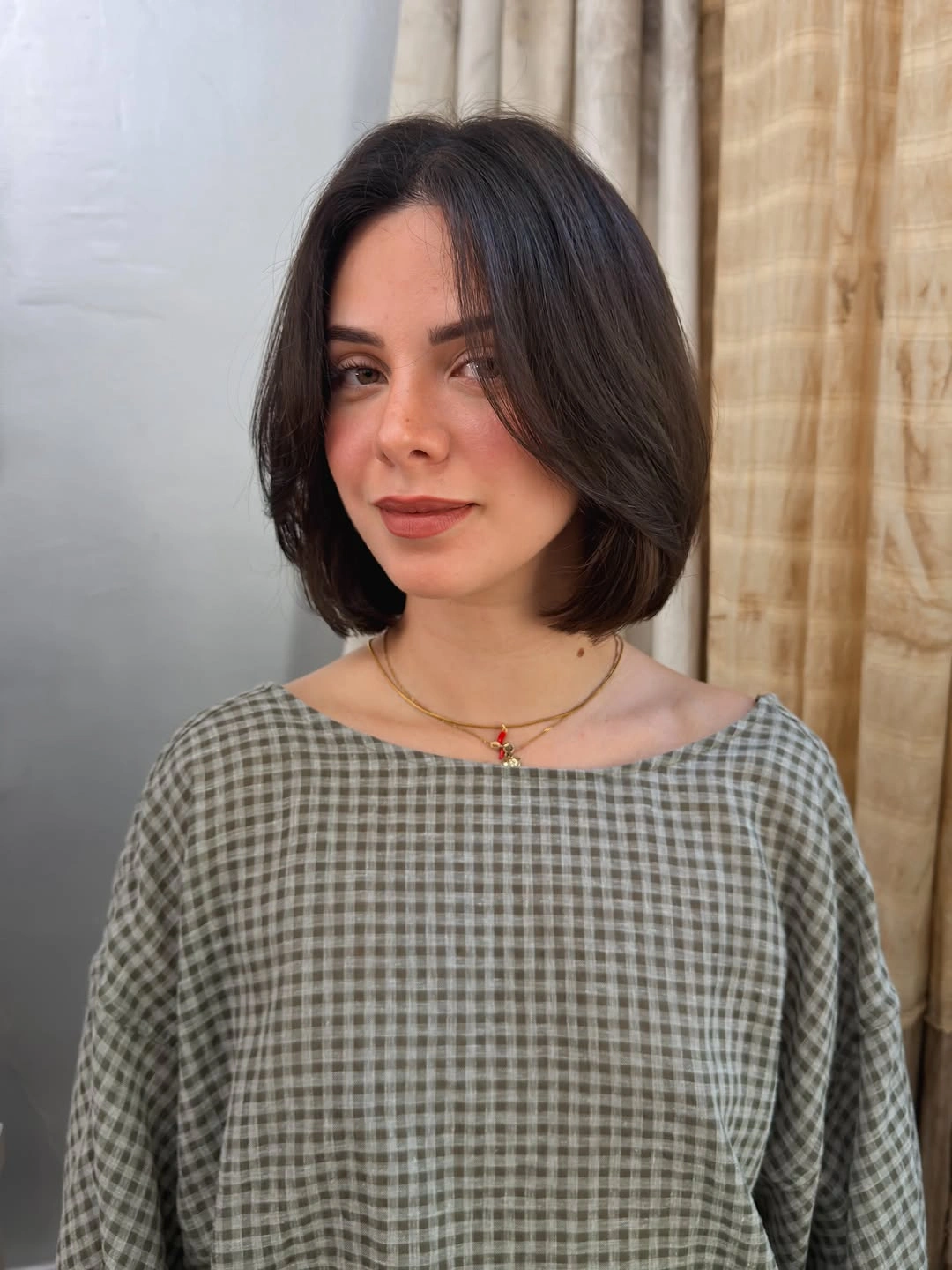 bobbed haircut for women Classic Jaw-Length Bob With Elegant Side Part