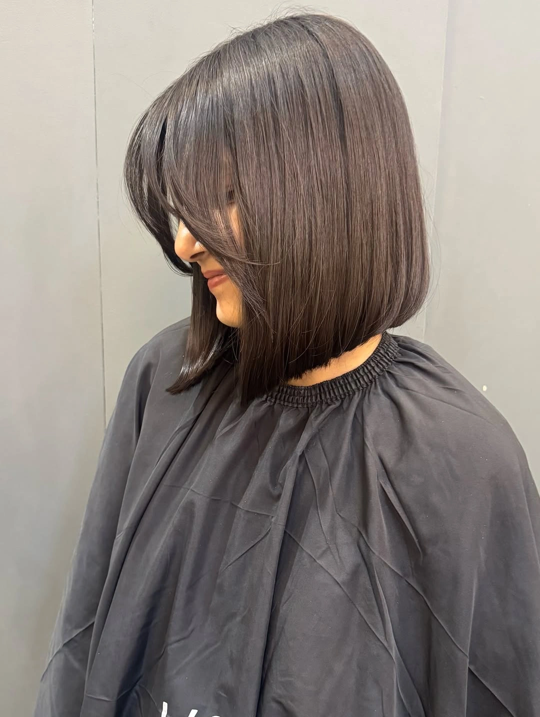 bobbed haircut for women Long Bob with Curtain Bangs and Soft Face-Framing Layers