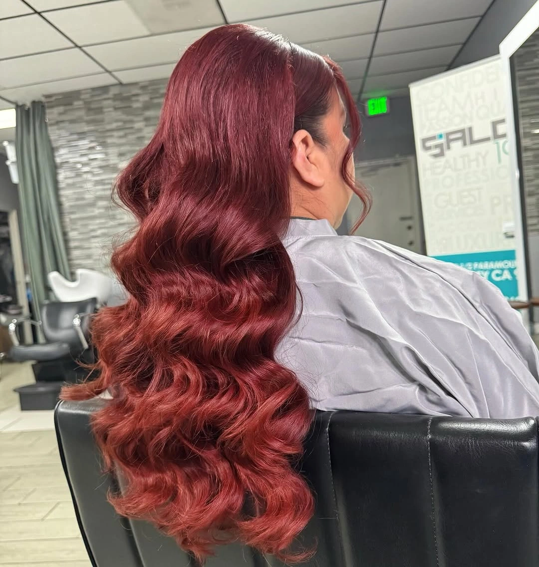 body waves hairstyle Rich Auburn Waves with Vintage-Inspired Volume