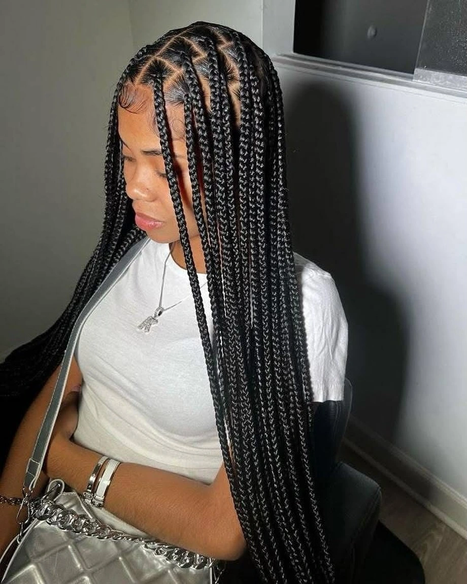 bora bora braids hairstyle Classic Long Knotless Braids With Balanced Center Part