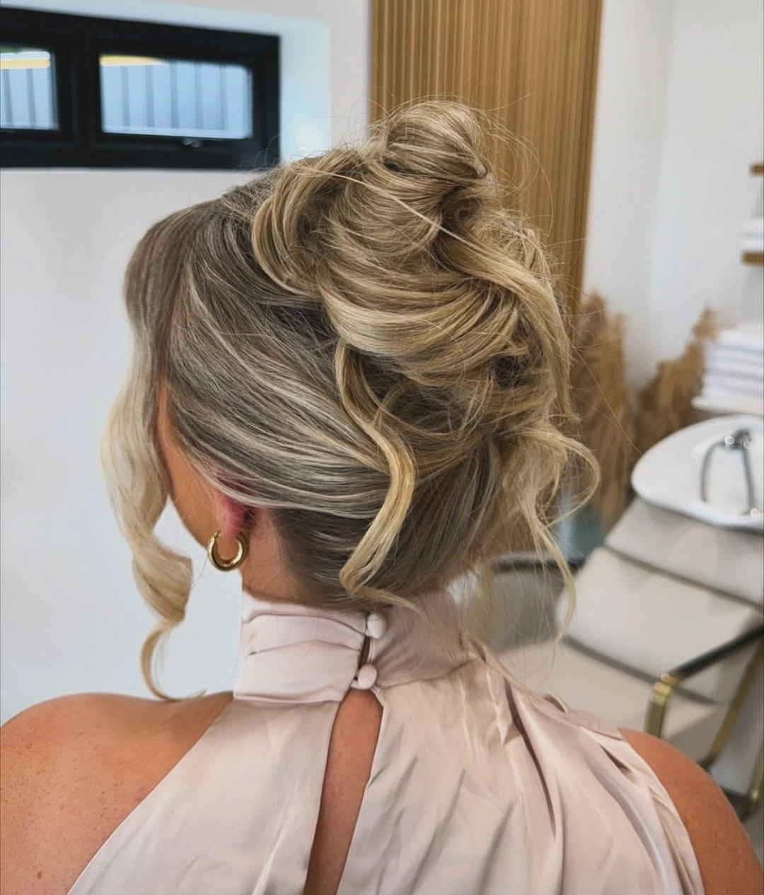 bridesmaid hairstyling Relaxed Textured Bun with Modern Volume