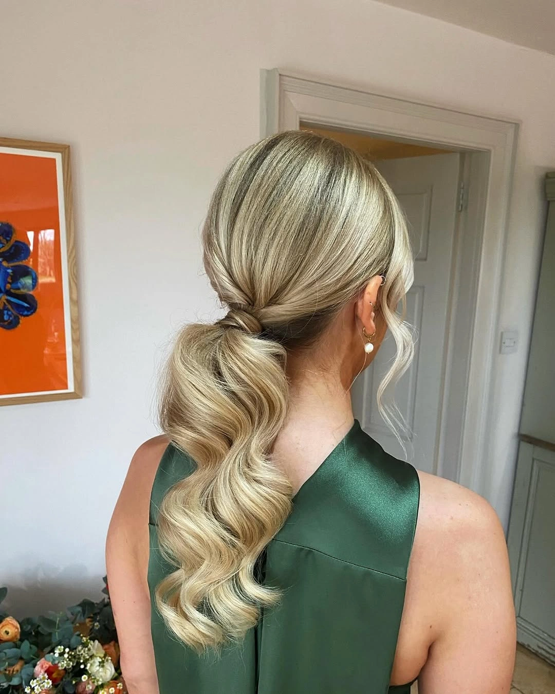 bridesmaid hairstyling Soft Low Ponytail with Flowing Glamorous Waves