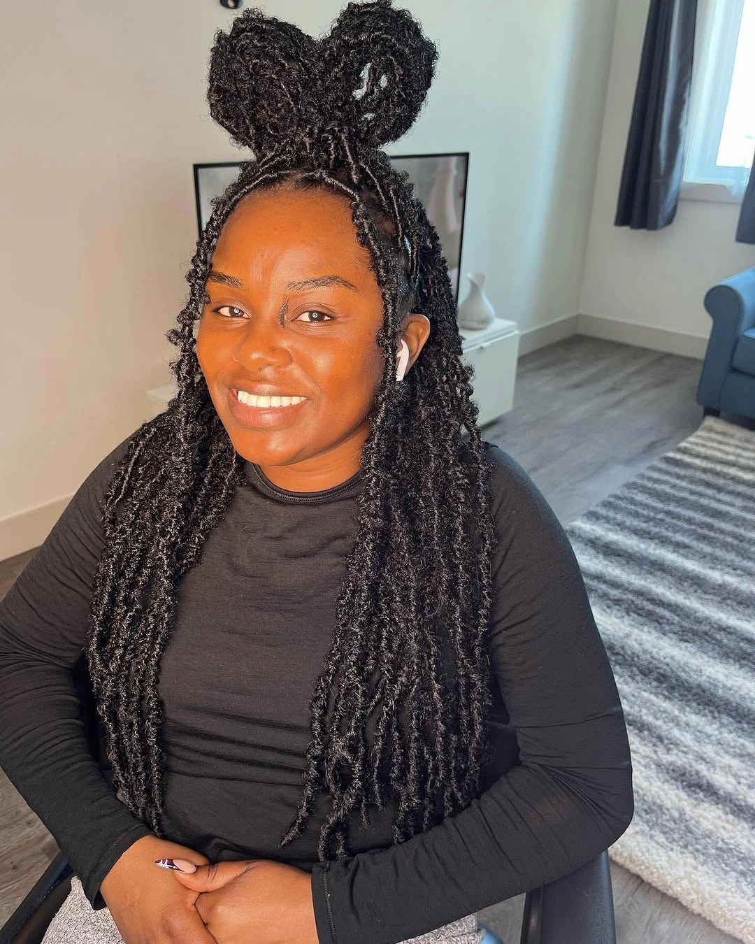 butterfly braids hairstyle Butterfly Twists Styled Into Double Space Buns