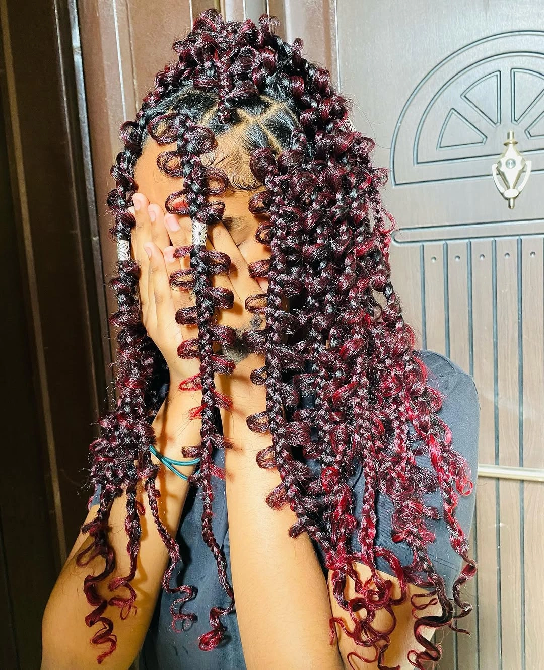 butterfly braids hairstyle Burgundy Butterfly Braids With Defined Spiral Coils