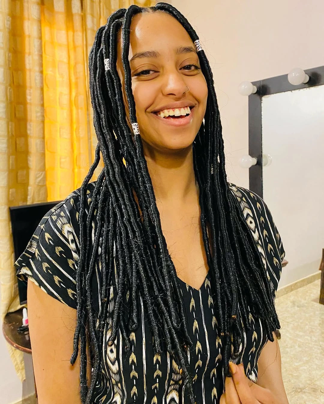 butterfly braids hairstyle Classic Butterfly Faux Locs With Minimalist Hair Jewelry