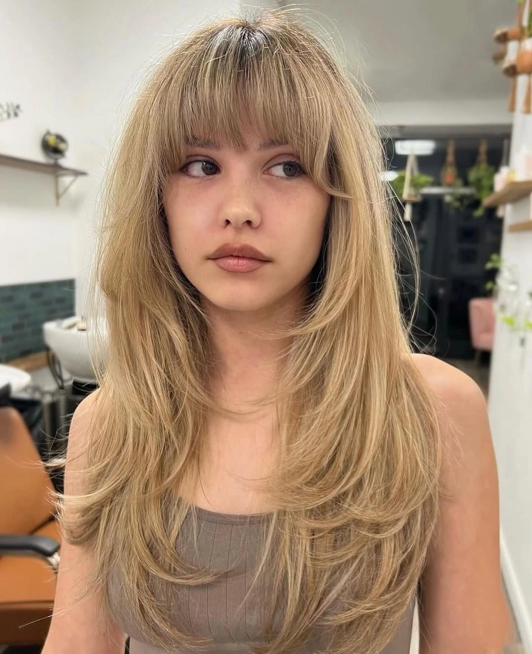 choppy medium layered hair Soft Blonde Layered Hair With Wispy Bangs