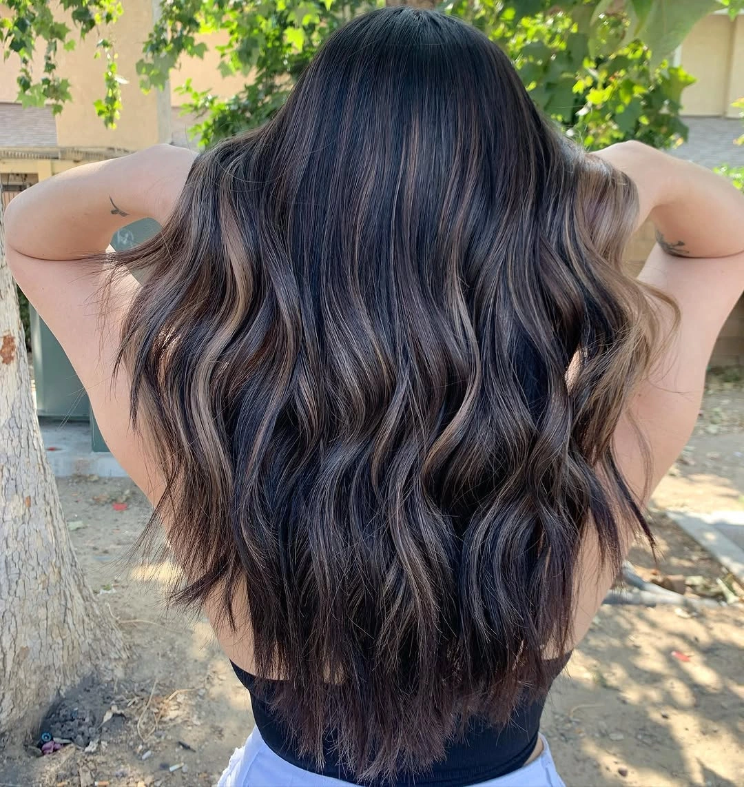 dimensional brunette hair color Long Brunette Waves With Soft Beige Dimension