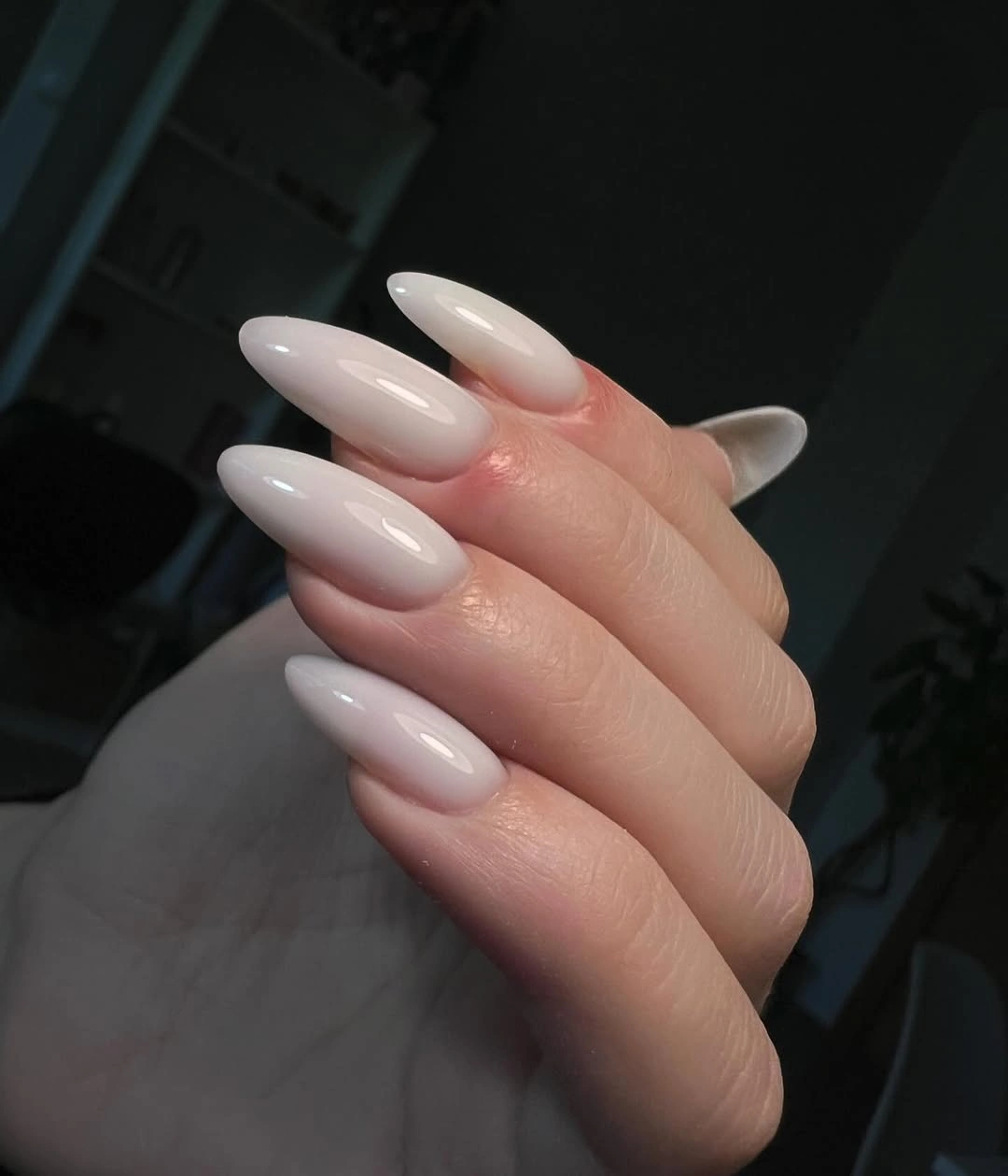 milky white ombre almond nails with glossy finish