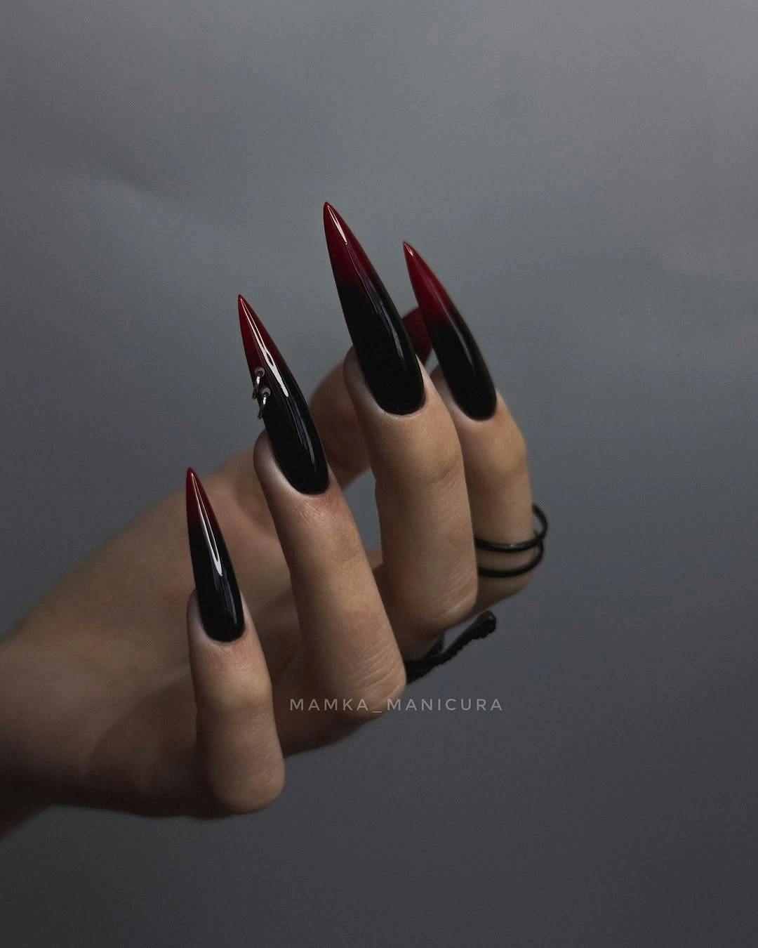 black almond nails with burgundy ombre tips