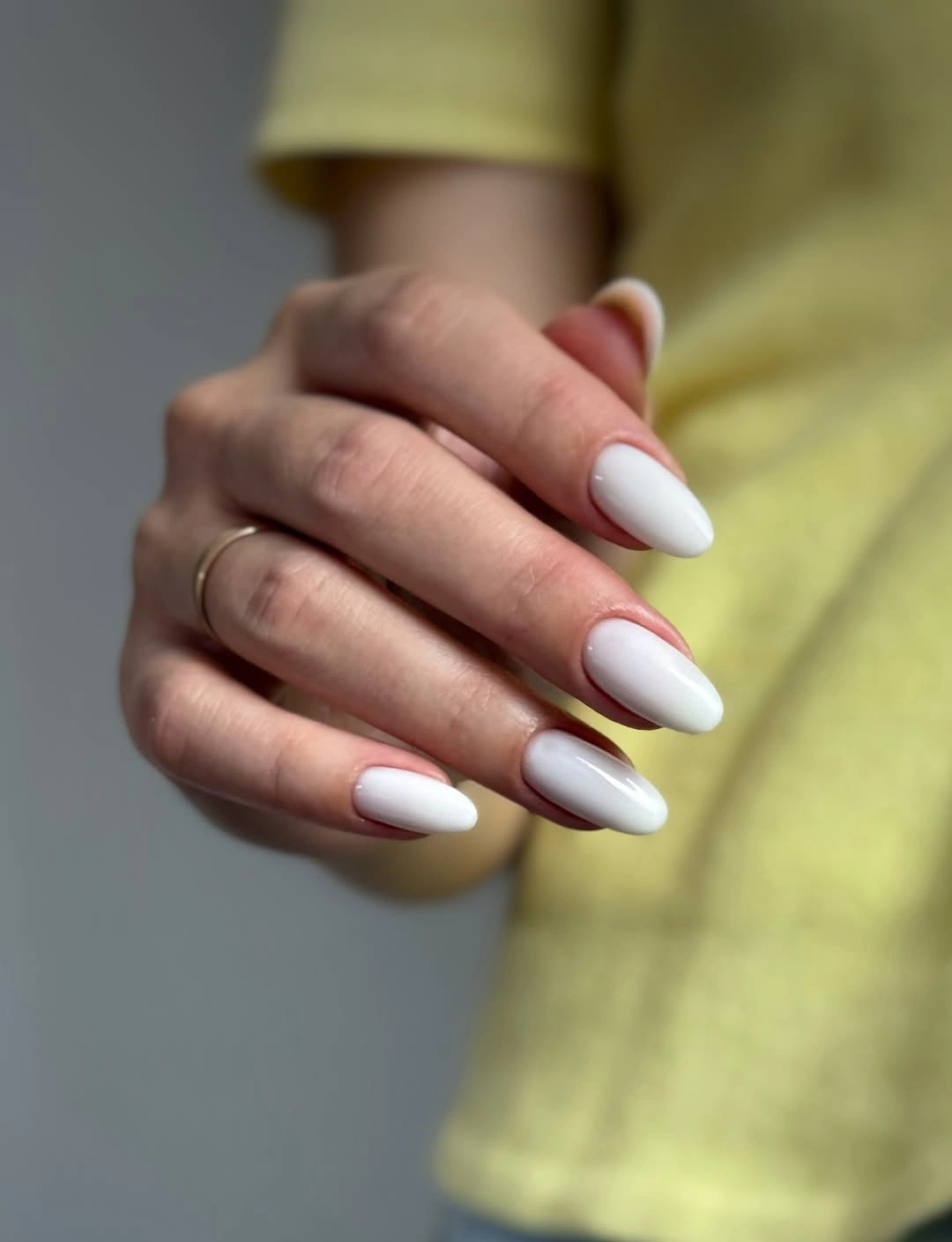 opaque white almond nails with clean glossy finish